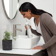 Cordless Pearl Water Flosser + FREE TheraBreath Fresh Breath Oral Rinse!